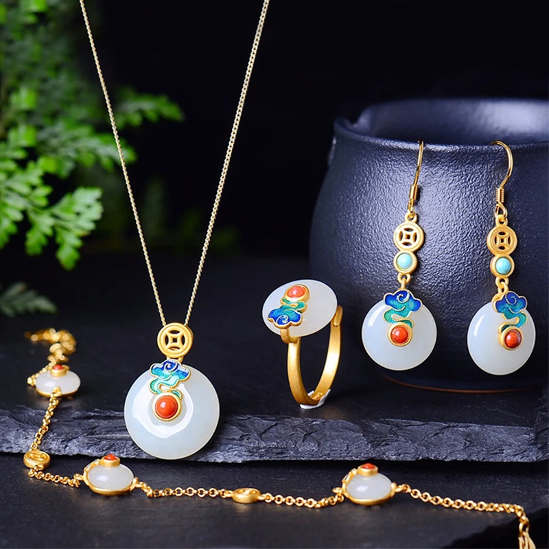 

Hetian jade four-piece jewelry enamel color Xiangyun s925 silver inlaid white jade peace buckle ring earring necklace bracelet j