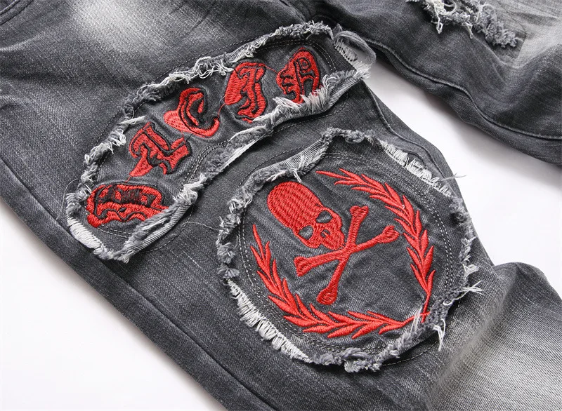 Джинсы женские рваные с вышивкой черепа в стиле панк