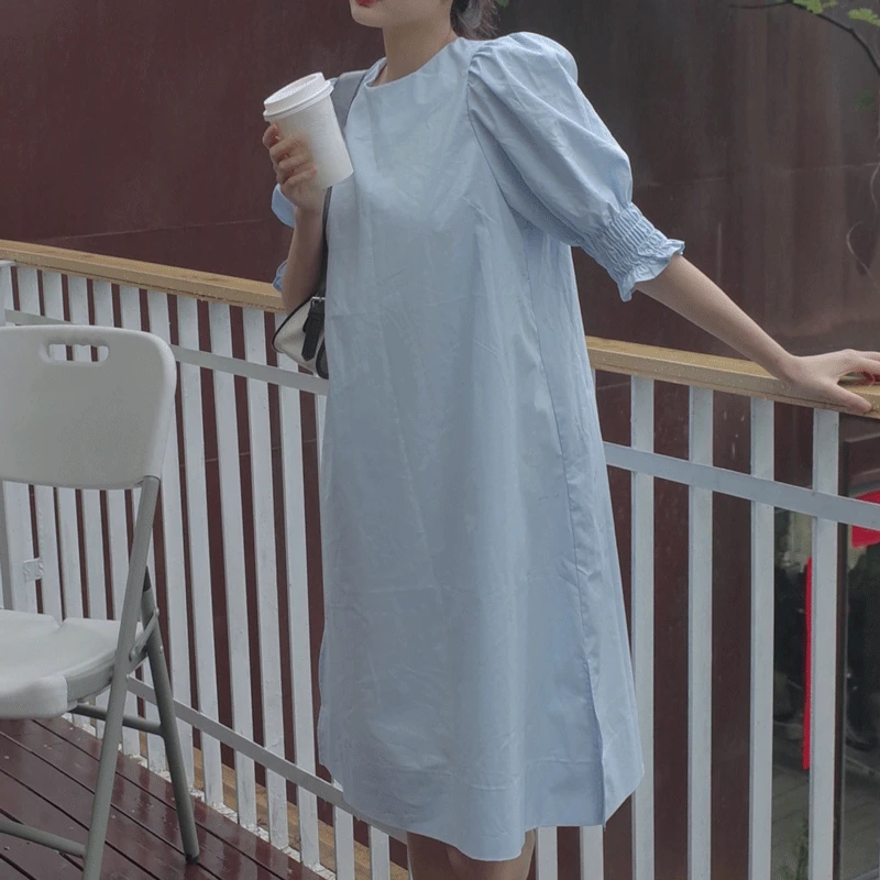 

Cotton puff sleeve side slit dress simple temperament female loose slim A-line dress
