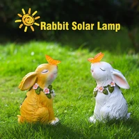 solar rabbit garden statues light bunny holding butterfly garden lawn yard decoration statue animal figurines solar rabbit light