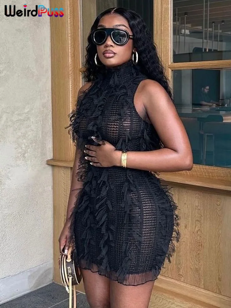 Женское трикотажное платье с бахромой