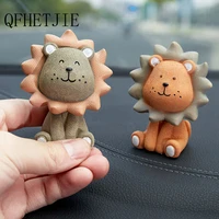 qfhetjie 2022 new car ornaments cute shaking head little lion ornament car decoration auto interior accesories gift for sale