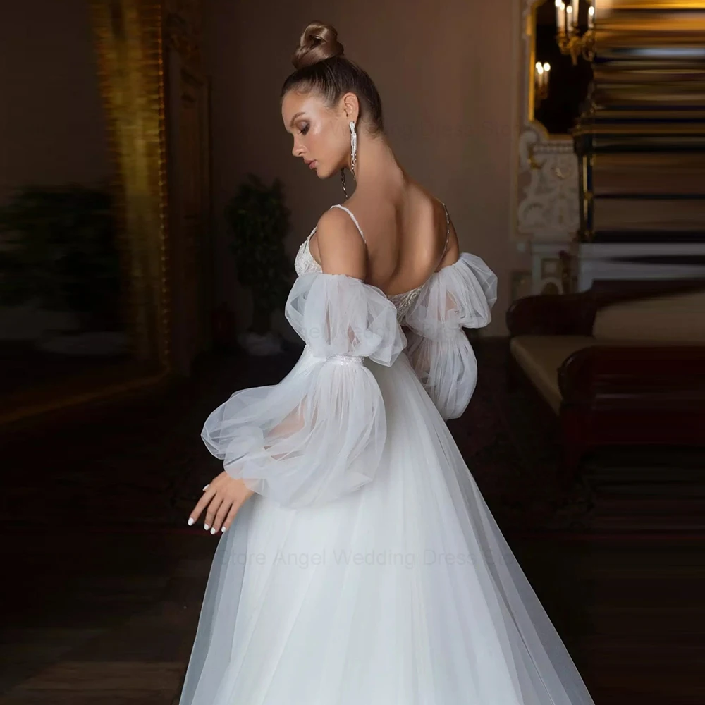Фото Белое Тюлевое свадебное платье с а-силуэтом ANGEL Princess, свадебное платье в стиле бохо с длинными рукавами-фонариками, свадебная одежда на бретелях-спагетти для невесты №5