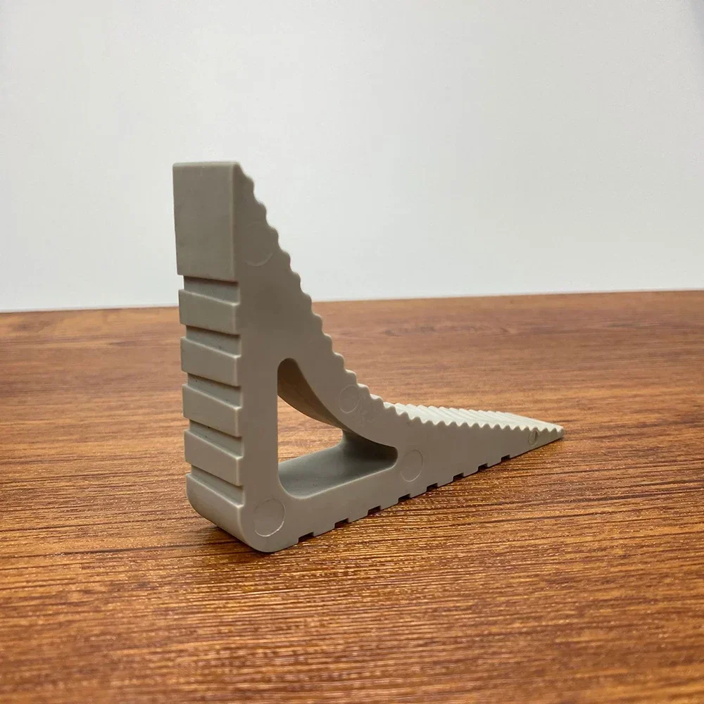 

Резиновый дверной ограничитель черный