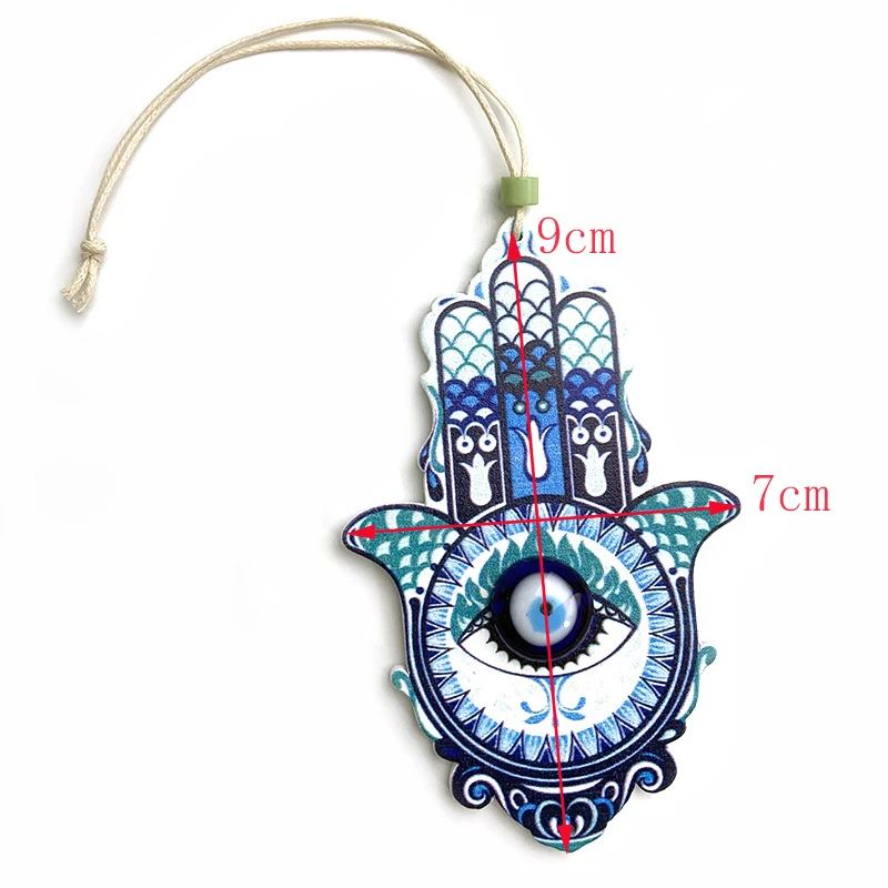 

Деревянная подвеска с голубым сглазом