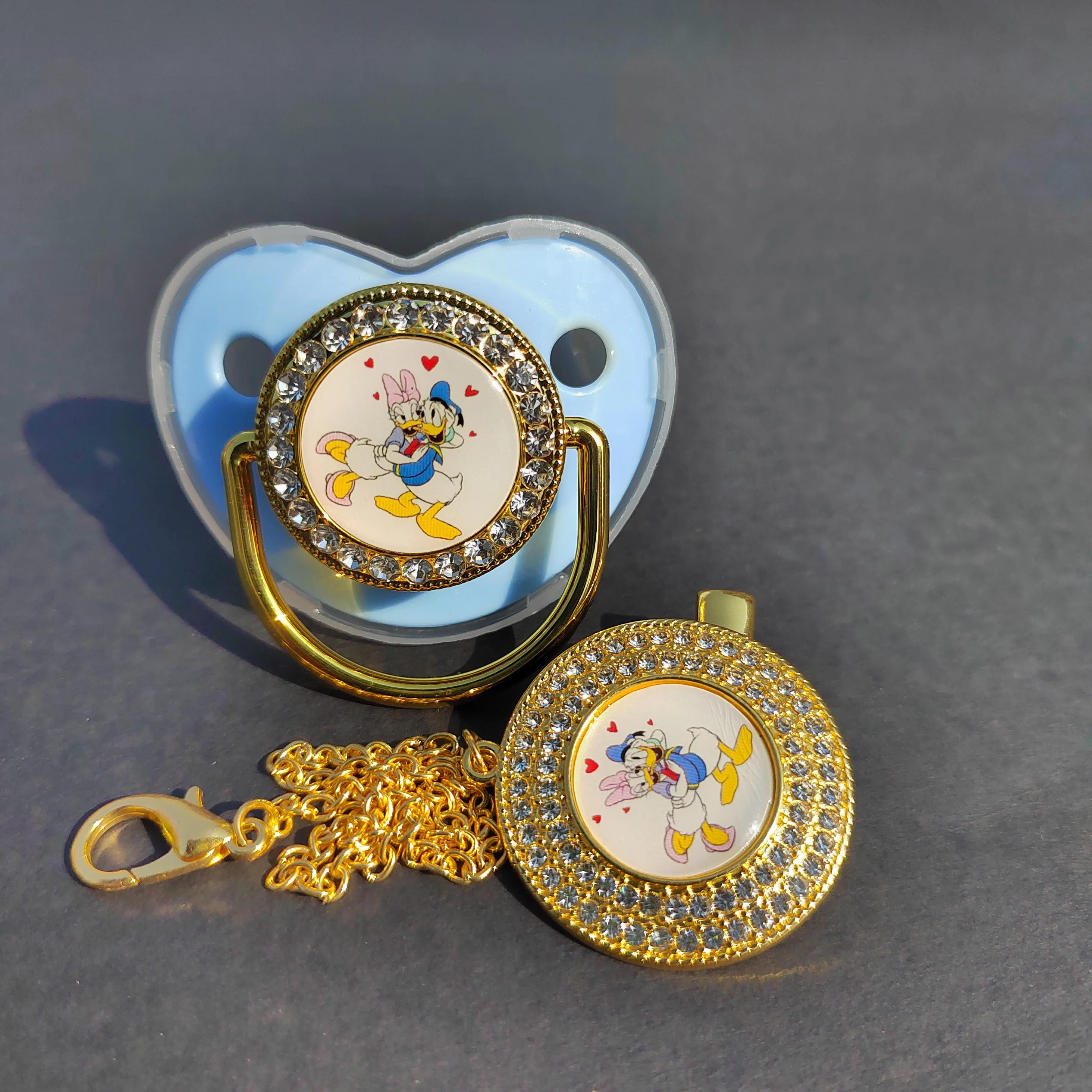

2022 Newborn Baby Pacifier Clip Donald Duck Shiny Silicone Pacifier Baby Pacifier Holder BPA Free Baby Shower Gifts baby item