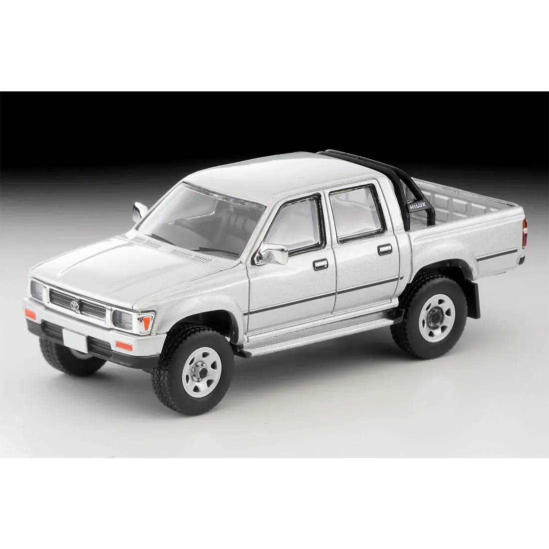 Фото Оригинальная модель Tomytec Tomica Limited Vintage NEO LV-N256c Toyota Hilux 4WD Pickup Double Cab SSR 1991 Silver 1/64, литая под давлением, масштаб 1:64 №1