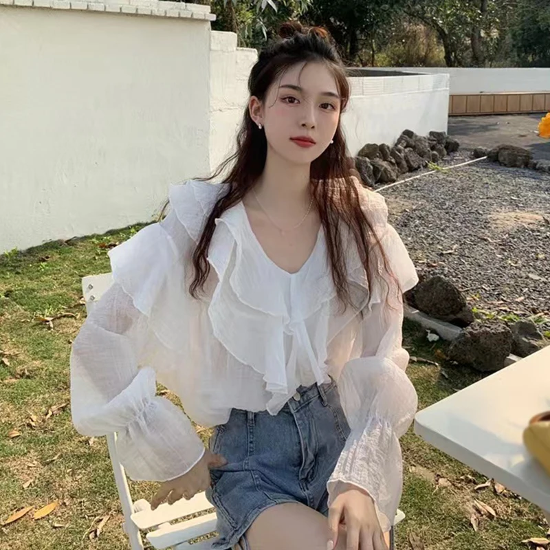

Long sleeved Ruffled Spring and autumn shirts Irregular Design feel V-neck Women's shirts Chiffon shirts Loose fitting
