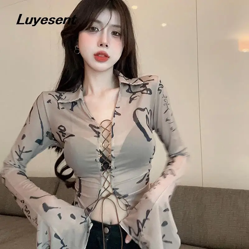 

Women Harajuku Flare Long Sleeve Mesh Blouse 2023 Spring Lady Character Hollow Out Lace Up Bust Thin Slim Blouses Mujer Blusa