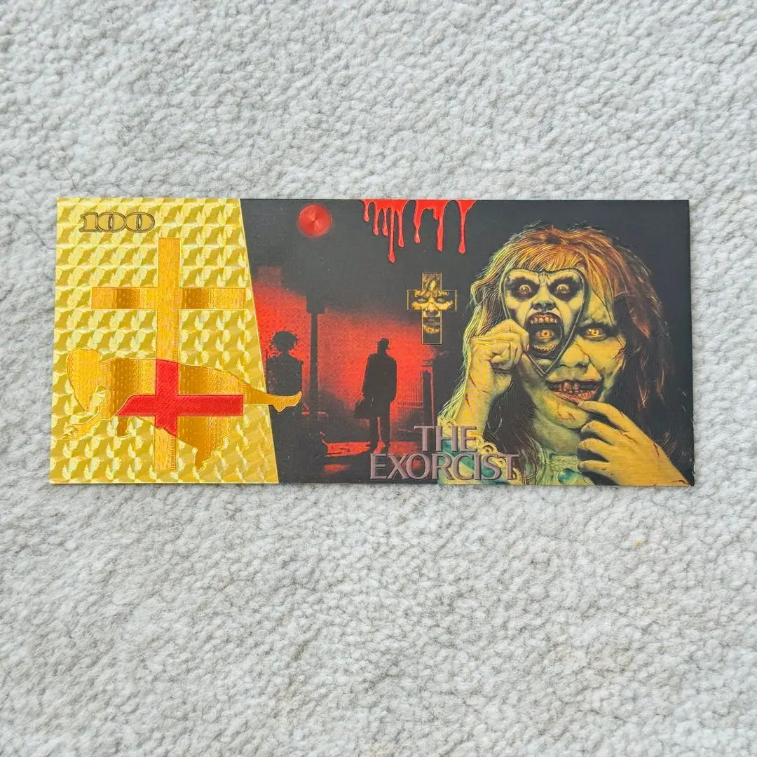 Золотые банкноты США 2026 года с изображением ужасов