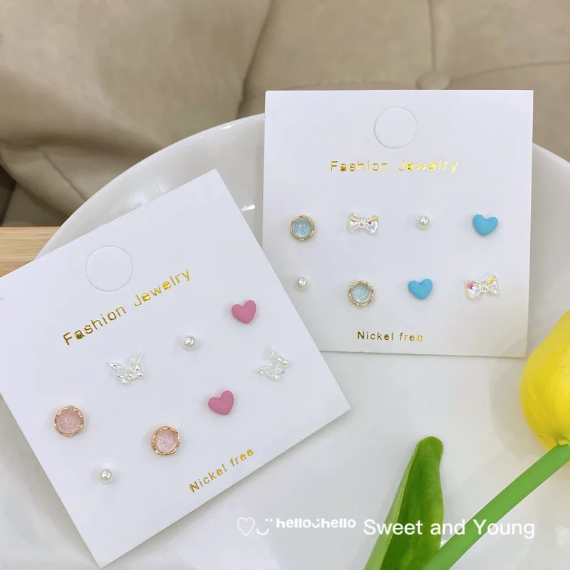 

Серьги-гвоздики из серебра 925 пробы с голубым и розовым опалом