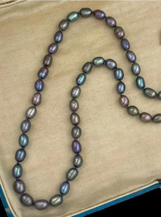 

Исключительное ожерелье из черного павлина с жемчугом диаметром 11-13 мм диаметром 18 дюймов