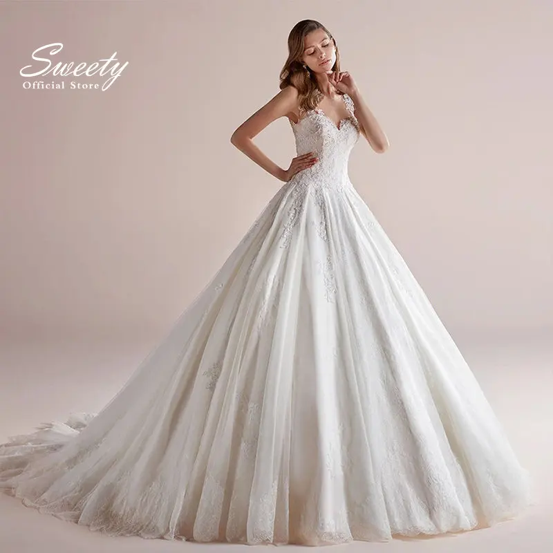 

Luxury Elegant Wedding Dress Silky Organza With Princess Ball Gown Boat Neck Sleeveless Bride Gowns Backzipper Backless Applique