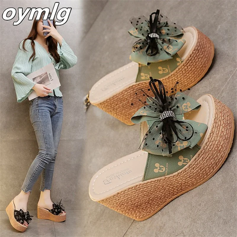 

2022summer new wedge heel flower muffin heel one-line large size women's sandals and slippers beach shoes women shoes high heel