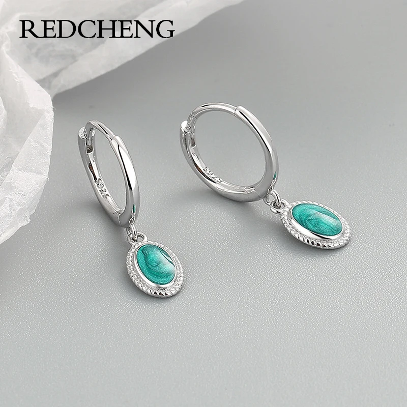 

Женские серьги из серебра 925 пробы с овальным камнем