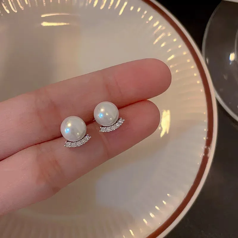 Серьги-гвоздики с жемчугом и цирконом серебро 925 пробы