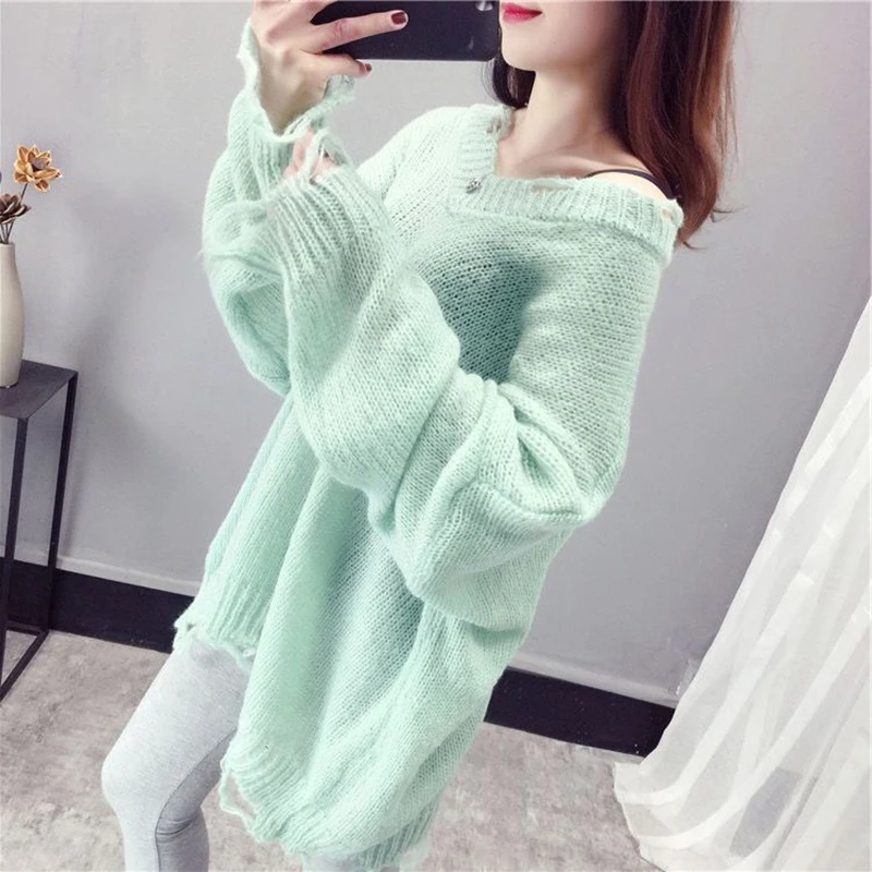 Женский трикотажный свитер с вырезами и V-образным вырезом |