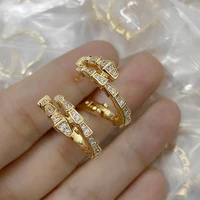 designer collection style women lady plated gold color inlaid cubic zircon snake snakelike dangle stud ear clip earrings