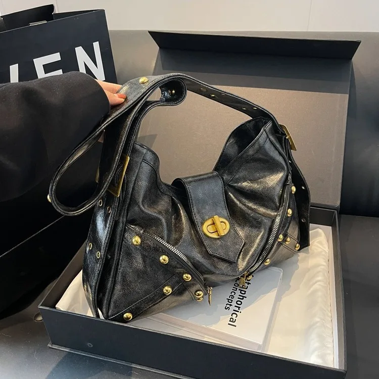 

Fashion women's bag waste land wind biker large capacity new 2023 fall and winter senior rivets diagonal cross shoulder bag
