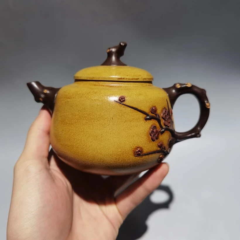 

Китайский исинский брикет желтого дуаня глины Zisha сливовый цветочный чайник из сырой руды старый художник 300 см3