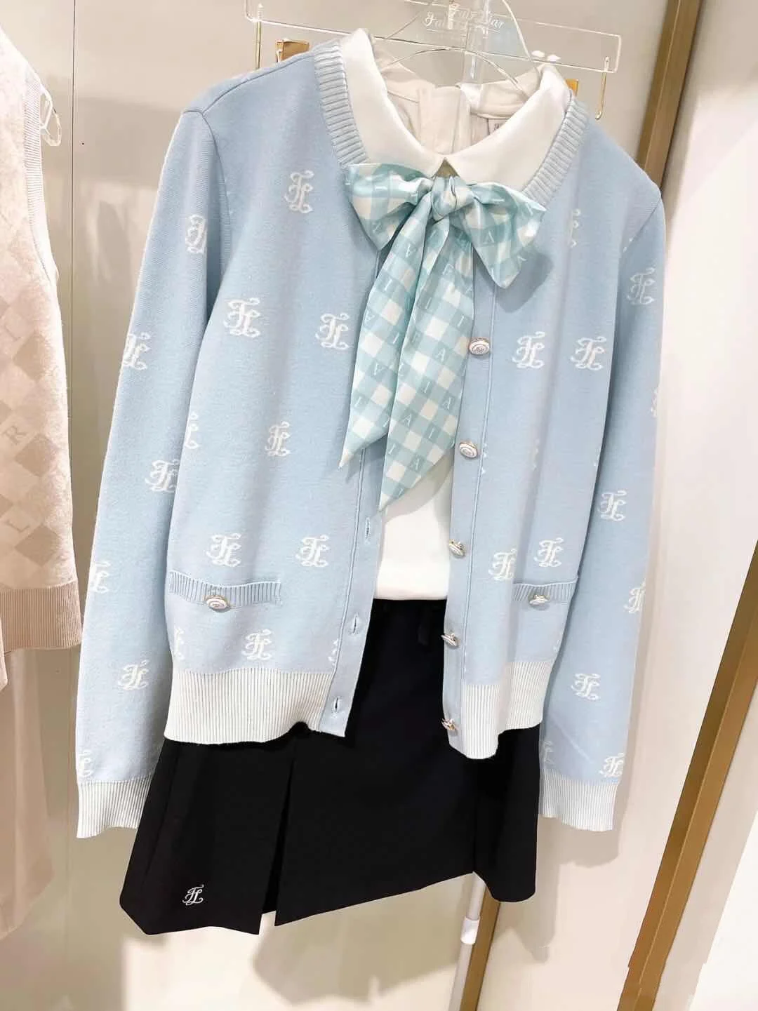 

Korean Golf women's autumn and winter long sleeve knitted cardigan coat soft tight buttock skirt suit 2022 NEW