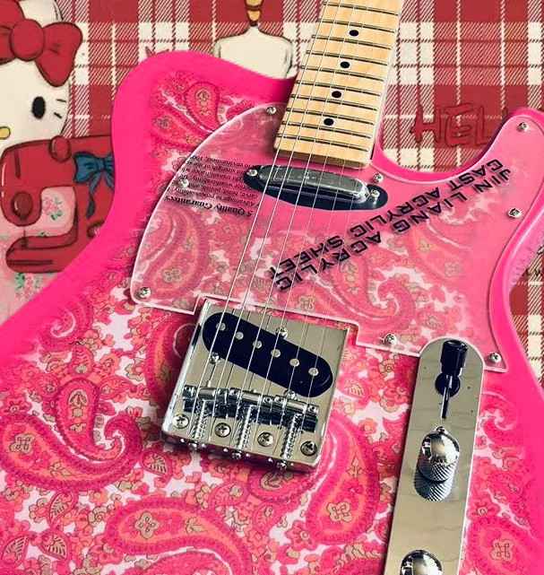 Электрическая гитара изготовленная из заводского клена и персикового дерева