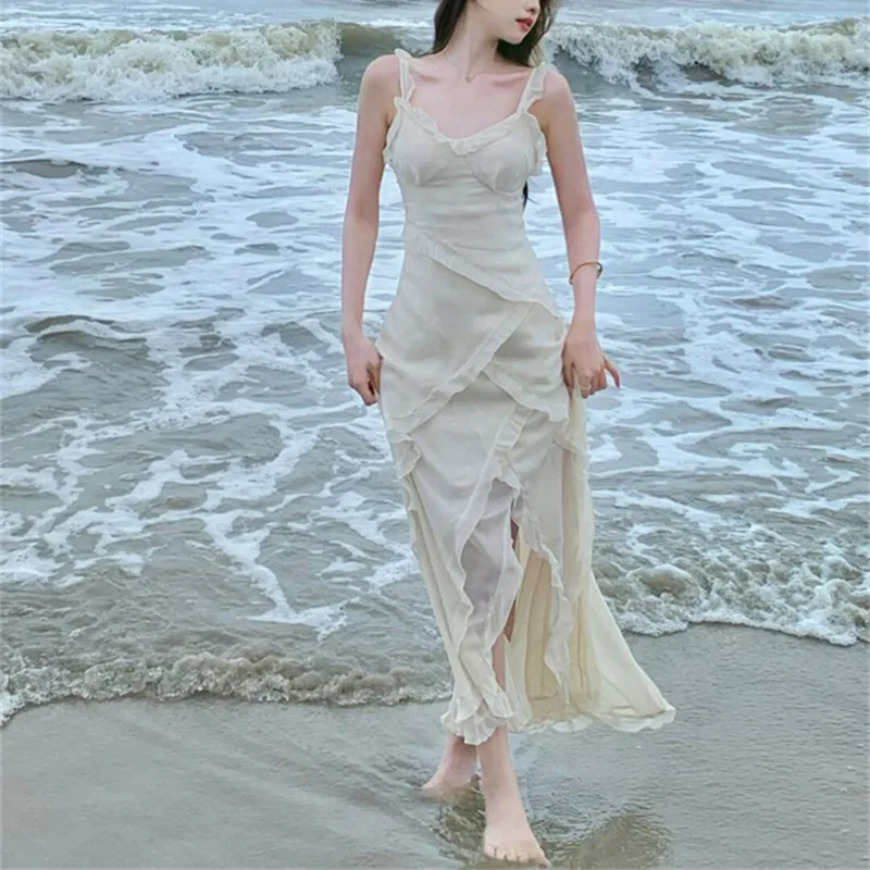 

2023 Beach Resort Beach Skirt Photography French Sling Dress French Gentle Temperament Long Dress Female Xia Xian