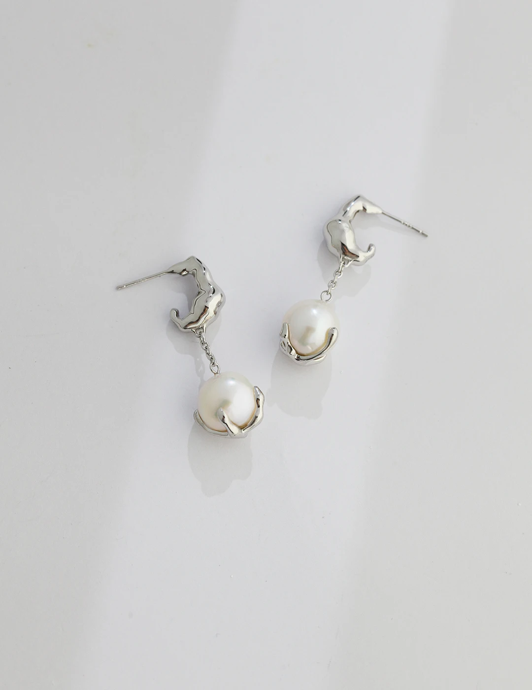 

Natural Pearl Earrings in Sterling Silver