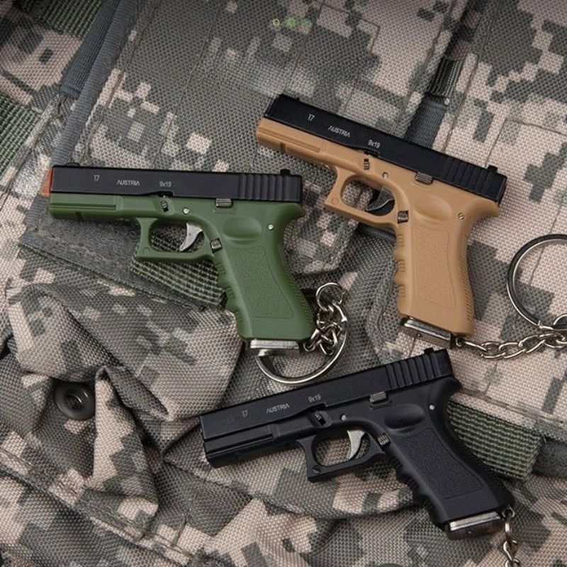 Фото Новая мини-пистолет G17 в штучной упаковке 1:3, модель полусплавного брелка, съемная декомпрессионная игрушка, 5 пулей, всплывающий мужской подарок №3