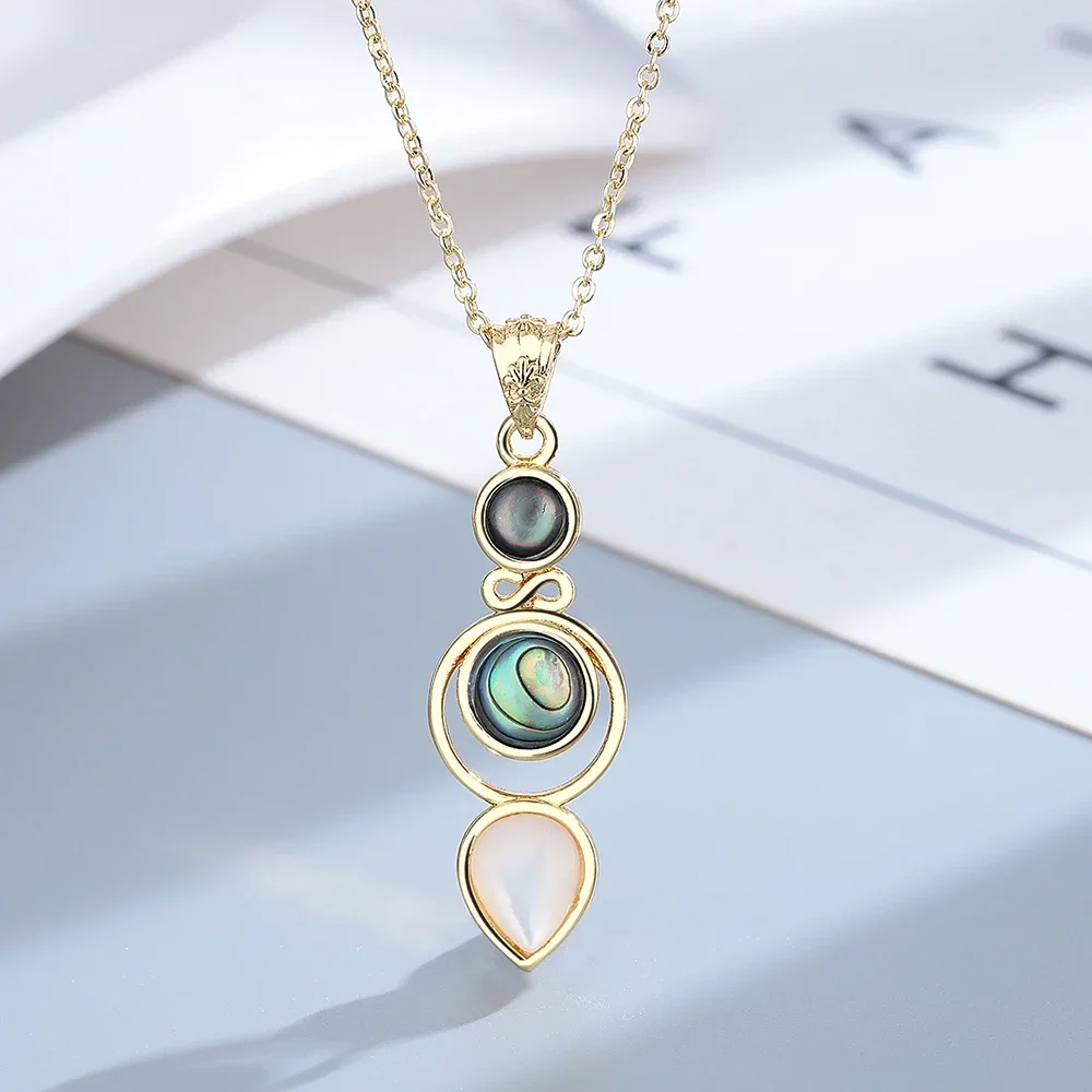 Женские серьги-кольца в виде ракушек