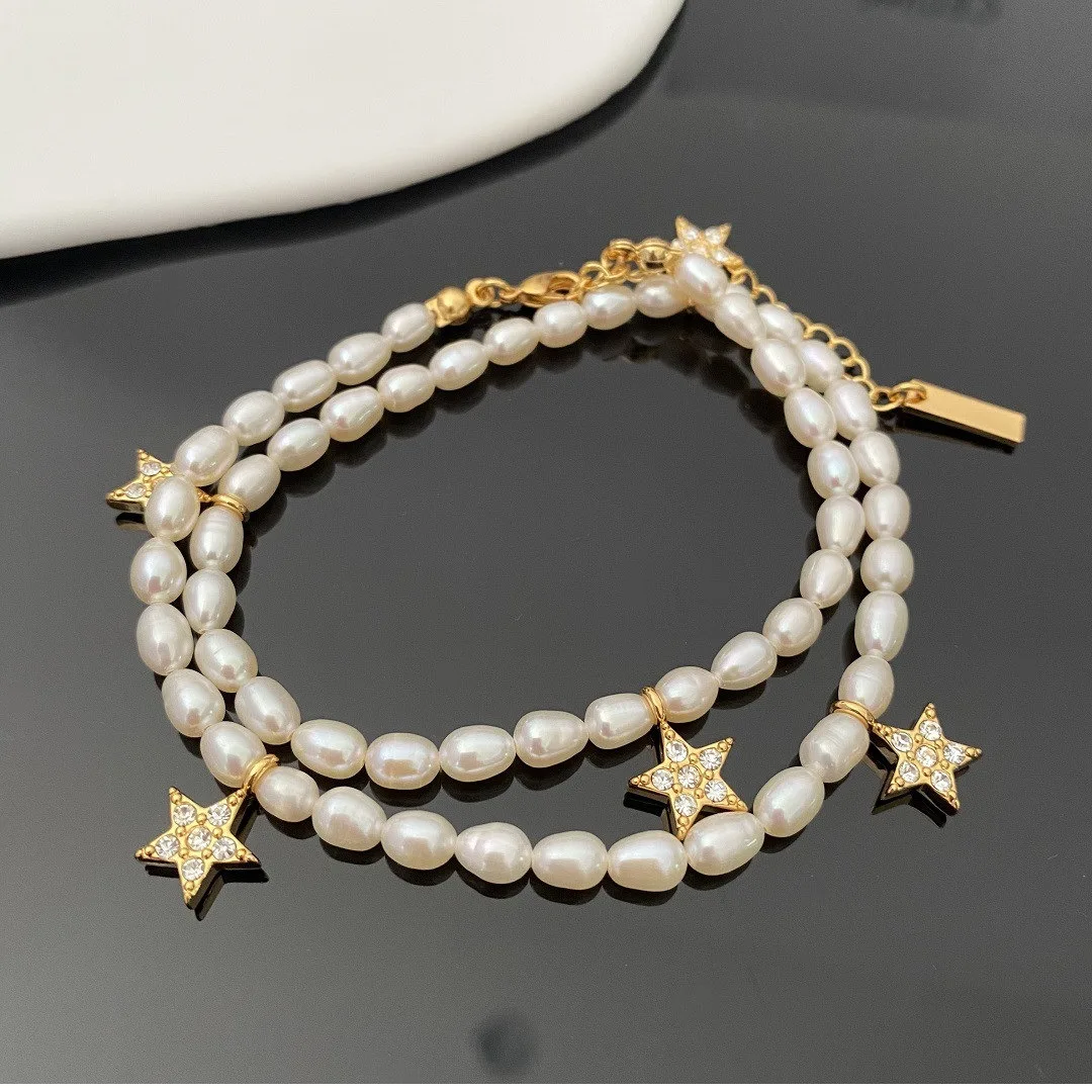 

Ожерелье с пятиконечной звездой, роскошное модное ожерелье в европейском и американском стиле с натуральным жемчугом и высоким чувством пр...