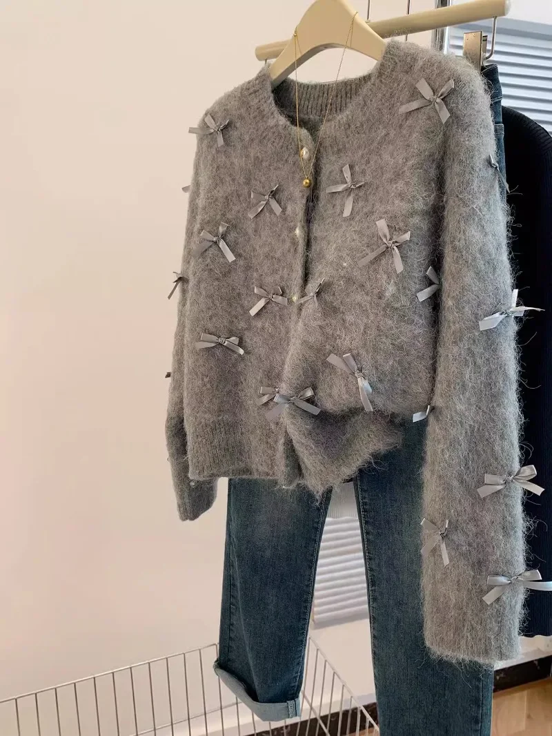 Женский вязаный кардиган с бантом