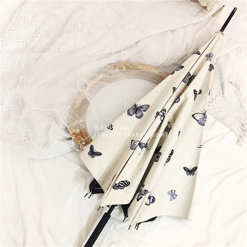 

Retro French sweet cool goddess butterfly long handle umbrella folding sunny umbrella black glue sunshade and UV protection