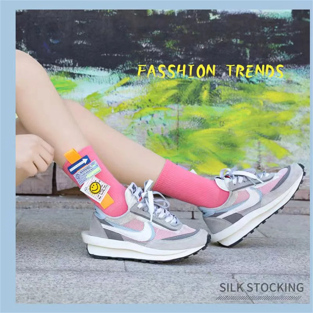 Cartoon smiling face fashionable fluorescent color medium tube socks Street hip hop basketball skateboard socks four seasons