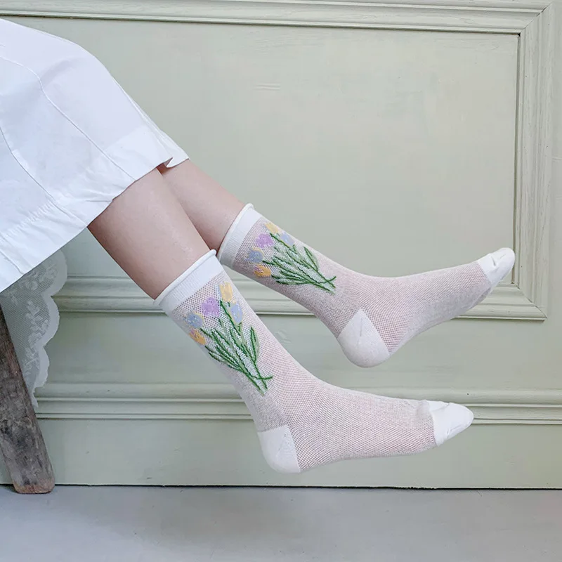 

SU socks black and white