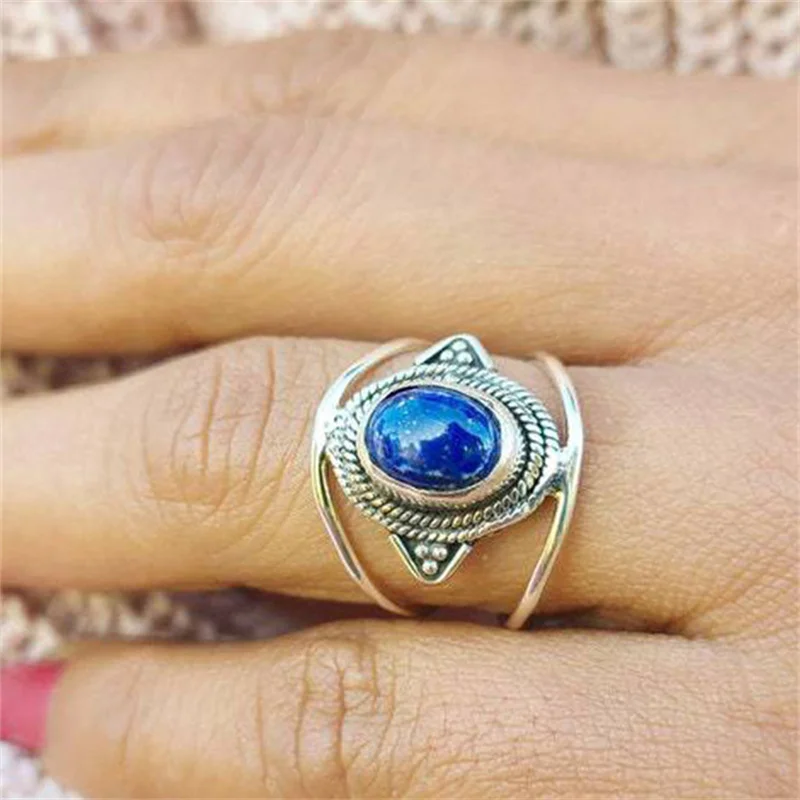 

Vintage Oval Inlaid with Blue Stone Rings Bohemian Silver Color Metal Hollow Carving Pattern Party Rings