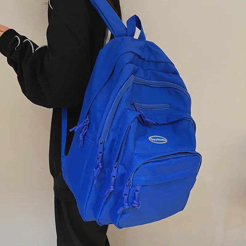 

Women Fashion Backpack 2022 Girl Casual Simple Solid Color Large Capacity Oxford Student Schoolbags With Seven Layers Of Pockets