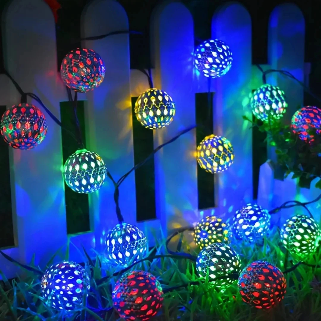 Фото Солнечные садовые светильники SCKDAY 50LED, 7 м, в форме марокканских металлических шаров, 8 режимов, уличные водонепроницаемые гирлянды для декора на Рождество №1