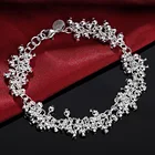 Женский браслет на цепочке с бусинами-штампами