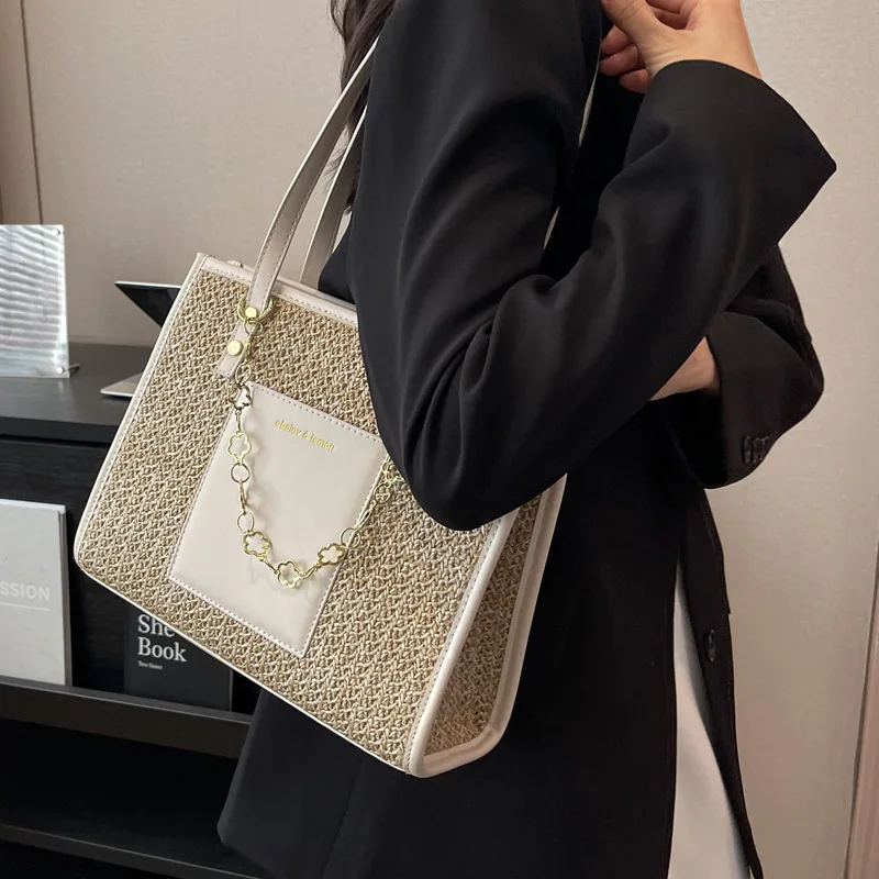 

Grass woven bag for women with large capacity 2023 new versatile shoulder bag woven summer high-quality commuting tote bag
