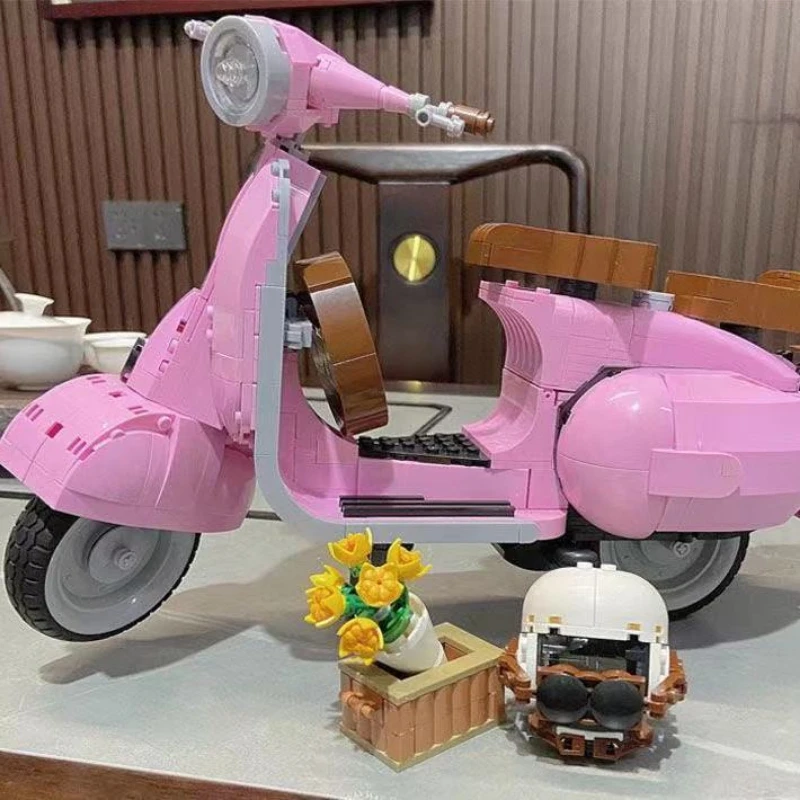 

2022 NEW 1106PCS Pink 10298 Vespa Motorcycle Sheep Car Movie Roman Holiday Assembled Building Blocks toy for children kids Gift