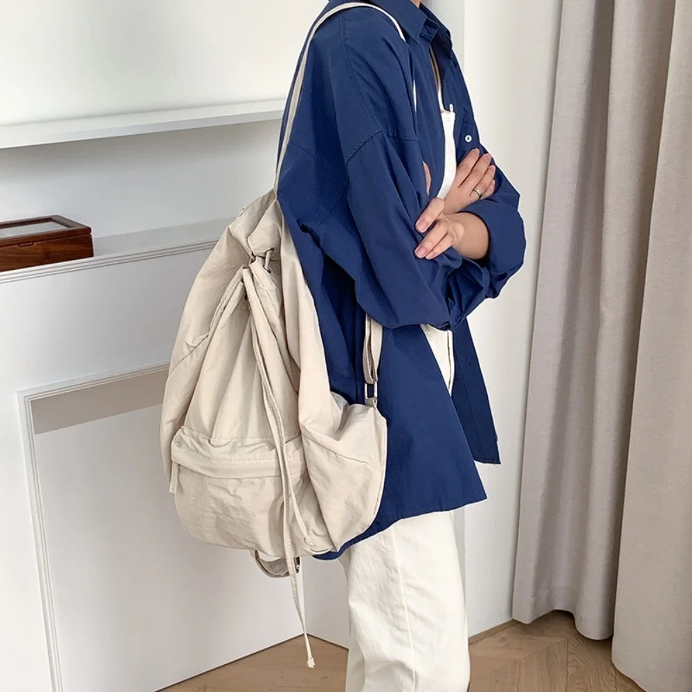 

Y2K Simple High Capacity Nylon Book Bag Casual Fashion Drawstring Student School Backpack Japanese Harajuku Lightweight Backpack