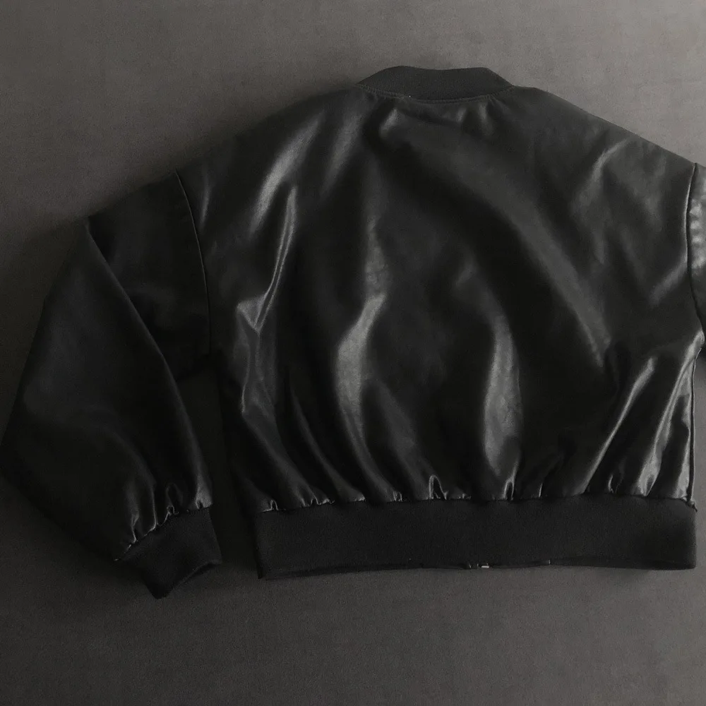 Threaded baseball suit leather bottom hem closed leather jacket spring and autumn short style motorcycle coat