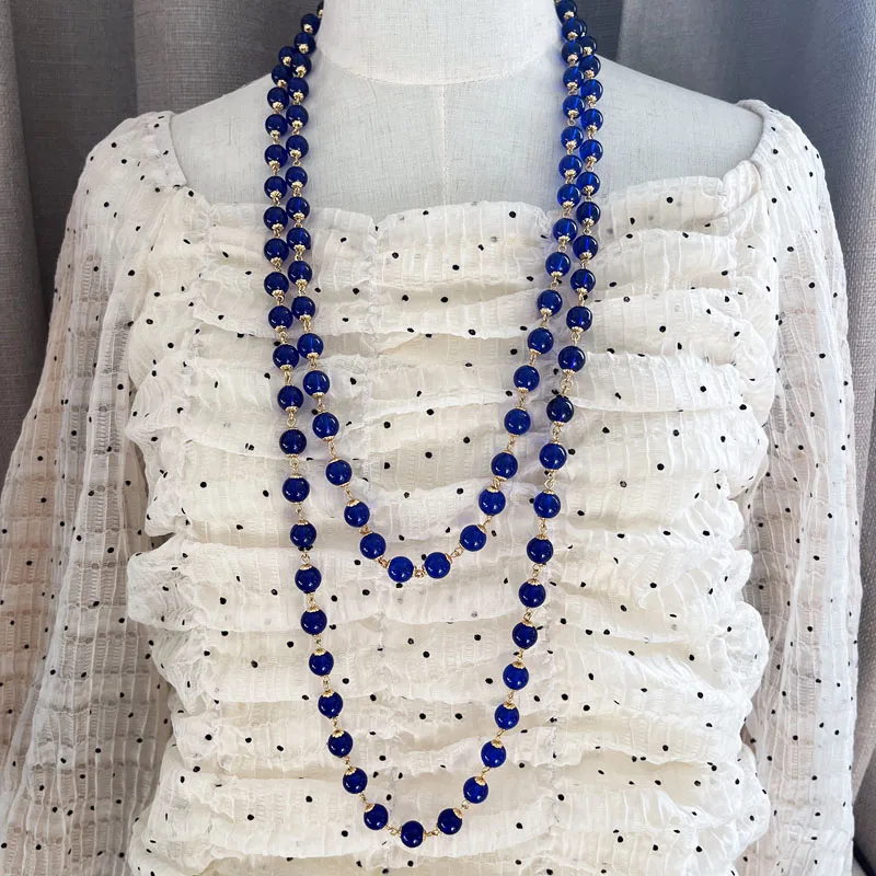 

Длинное ожерелье с подвеской из голубого стекла