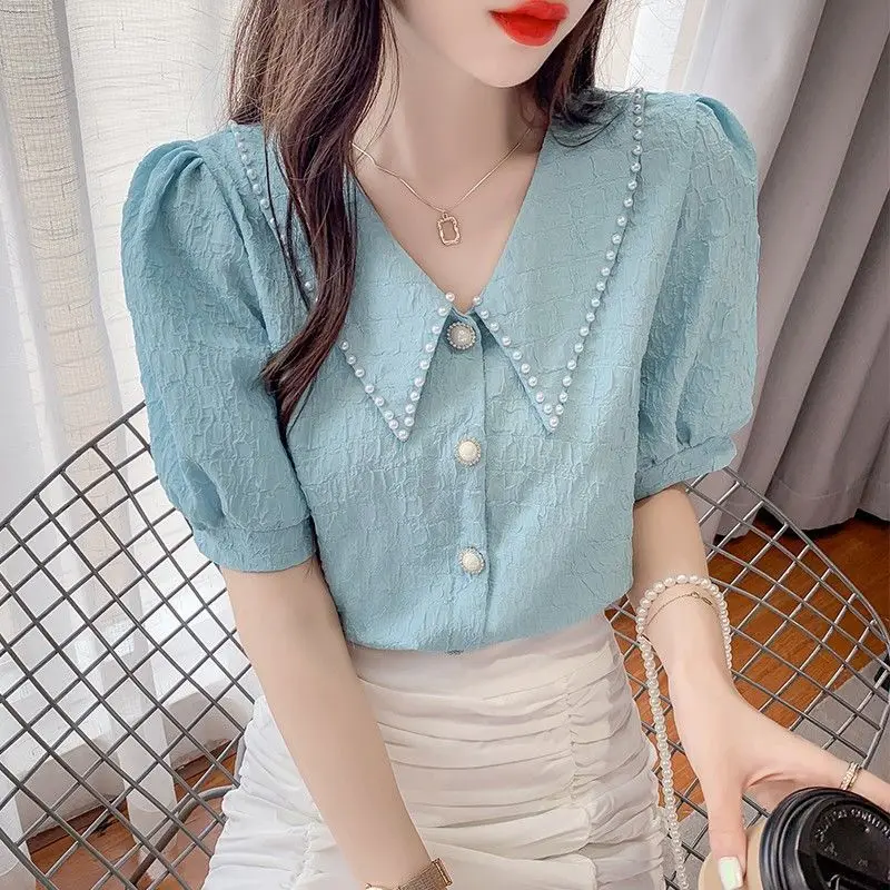 

Stylish Peter Pan Collar Button Spliced Beading Chiffon Shirt Women's Clothing 2023 Summer New Casual Top Loose Sweet Blouse A10