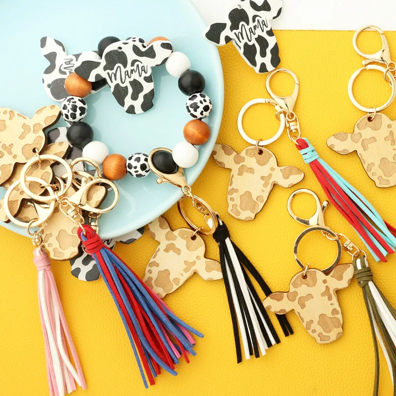 

2023 Cow Beads Leather Tassel Cute Cow Wood Bull Wooden Bead Wristlet Sliced Beef Head Western Denim Bracelet Cow Print Keychain