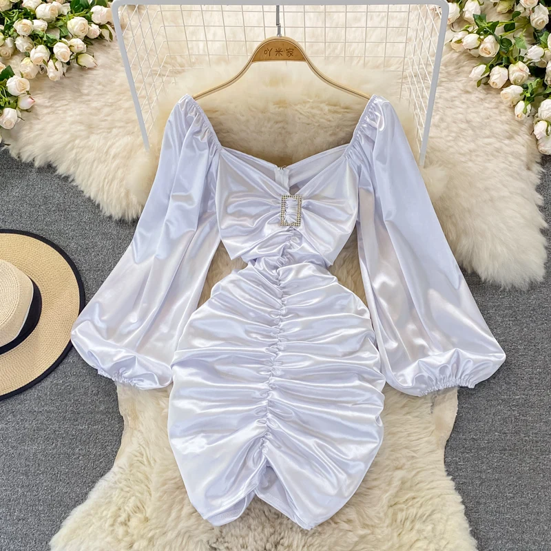 Женское облегающее платье-карандаш выше колена с длинным рукавом и V-образным