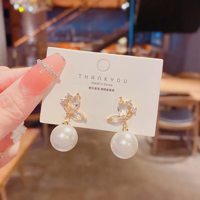 

S925 silver needle micro-set zircon bow pearl earrings French design sense of personality fashion temperament exquisite earrings