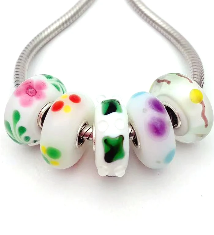 

Бусины из серебра 100% пробы с муранским стеклом