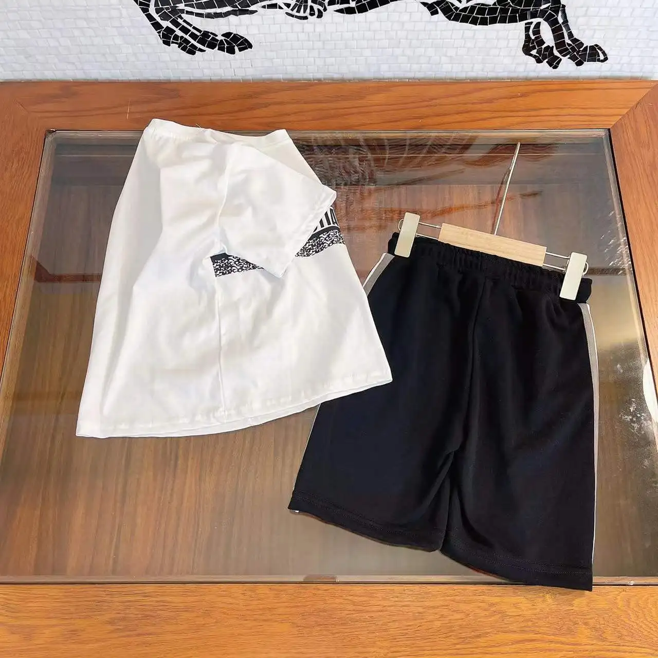 

high-end childrens clothing 2022 summer new boys girls foreign style short sleeve +shorts 2 pcs kids boys clothes set